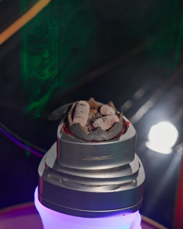 The shisha setup with coals on the top