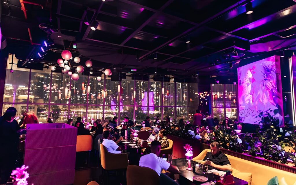 Family brunch restaurant in Dubai with colorful modern lighting.