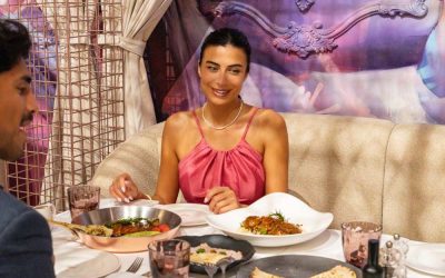 a couple having great food at Trove
