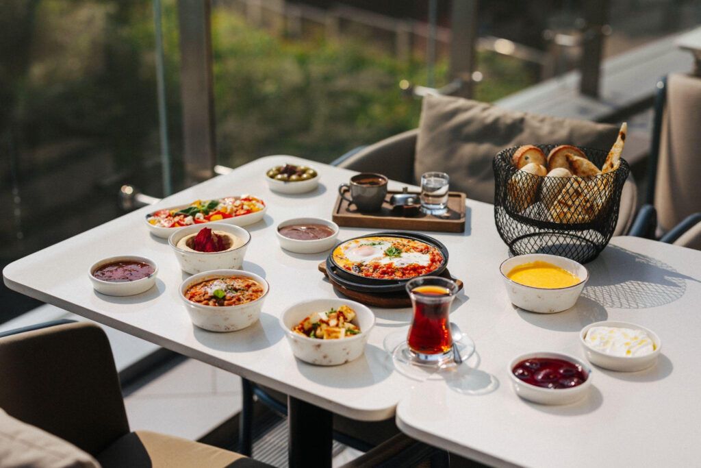 Outdoor dining table with appetizers.