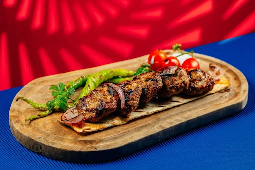Charcoal-grilled kofta on flatbread at Trove, one of the unique restaurants in Dubai